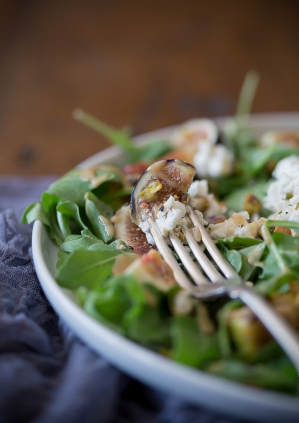 Fig Goat Cheese Salad with Fig Vinaigrette on a plate. 
