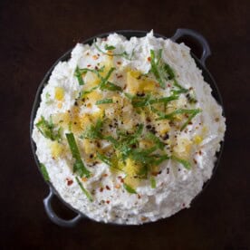 This preserved lemon and mint whipped feta dip is so easy to make you'll be making is all summer long. Ready in just 10 minutes and can be scooped up with crackers, vegetables or by the spoonful!