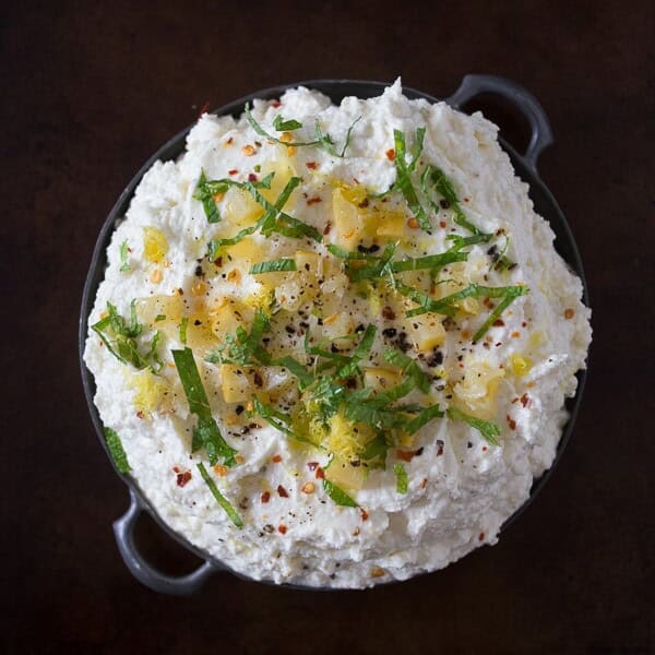 This preserved lemon and mint whipped feta dip is so easy to make you'll be making is all summer long. Ready in just 10 minutes and can be scooped up with crackers, vegetables or by the spoonful!