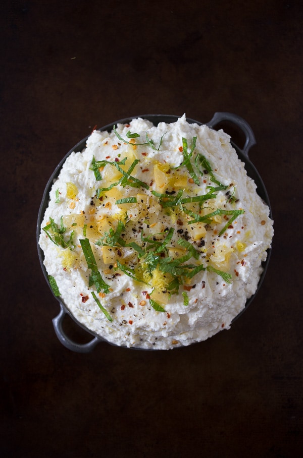 Preserved Lemon and Mint Whipped Feta Dip served on a table.