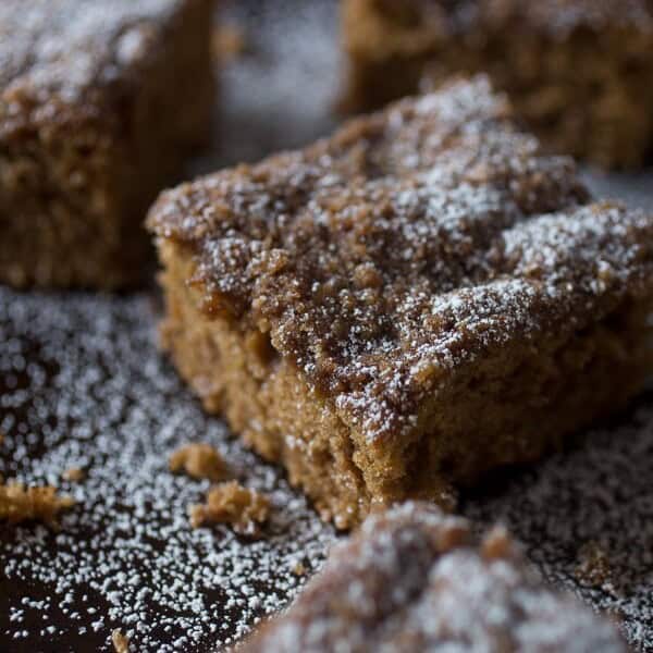 This sweet zucchini coffee cake is perfect for breakfast or dessert. Filled with fresh finely shredded zucchini and cinnamon brown sugar flavor. Perfectly moist and ready in no time!