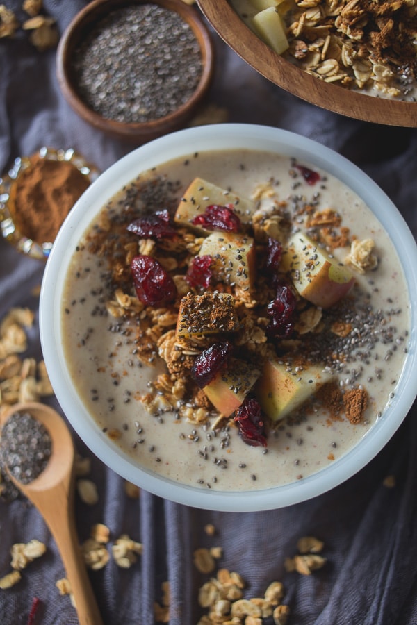 Apple Pie Smoothie Bowl in a small bowl topped with apples.
