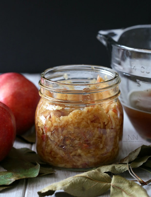 This homemade apple shrub is made using just freshly shaved apples, apple cider vinegar and sweet dark brown sugar. It's the best way to welcome fall.