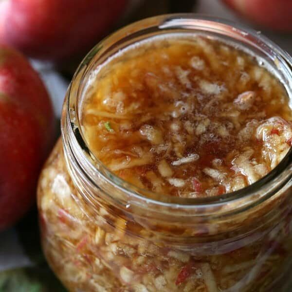 This homemade apple shrub is made using just freshly shaved apples, apple cider vinegar and sweet dark brown sugar. It's the best way to welcome fall.