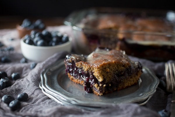 This blueberry fritter cake is the perfect way to celebrate the bounty of summer. Perfectly sweet, full of blueberries and super simple to make. You'll love the taste of the cake and it's perfect for breakfast or dessert.