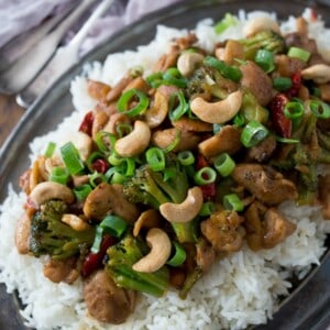 This spicy cashew chicken is better than take out. Made with delicious fresh ingredients and ready in just 30 minutes. It's fake out take out and it's delicious!