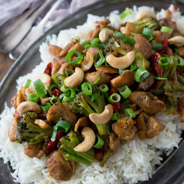 This spicy cashew chicken is better than take out. Made with delicious fresh ingredients and ready in just 30 minutes. It's fake out take out and it's delicious!