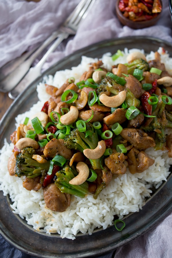This spicy cashew chicken is better than take out. Made with delicious fresh ingredients and ready in just 30 minutes. It's fake out take out and it's delicious!