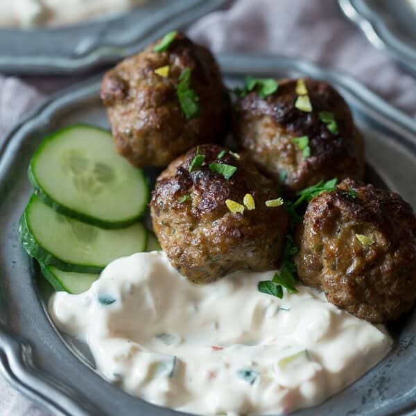These spicy meatballs with yogurt dipping sauce are the perfect appetizer or main course. Slightly spicy and perfectly cooled down when dipped. You'll love this combo!