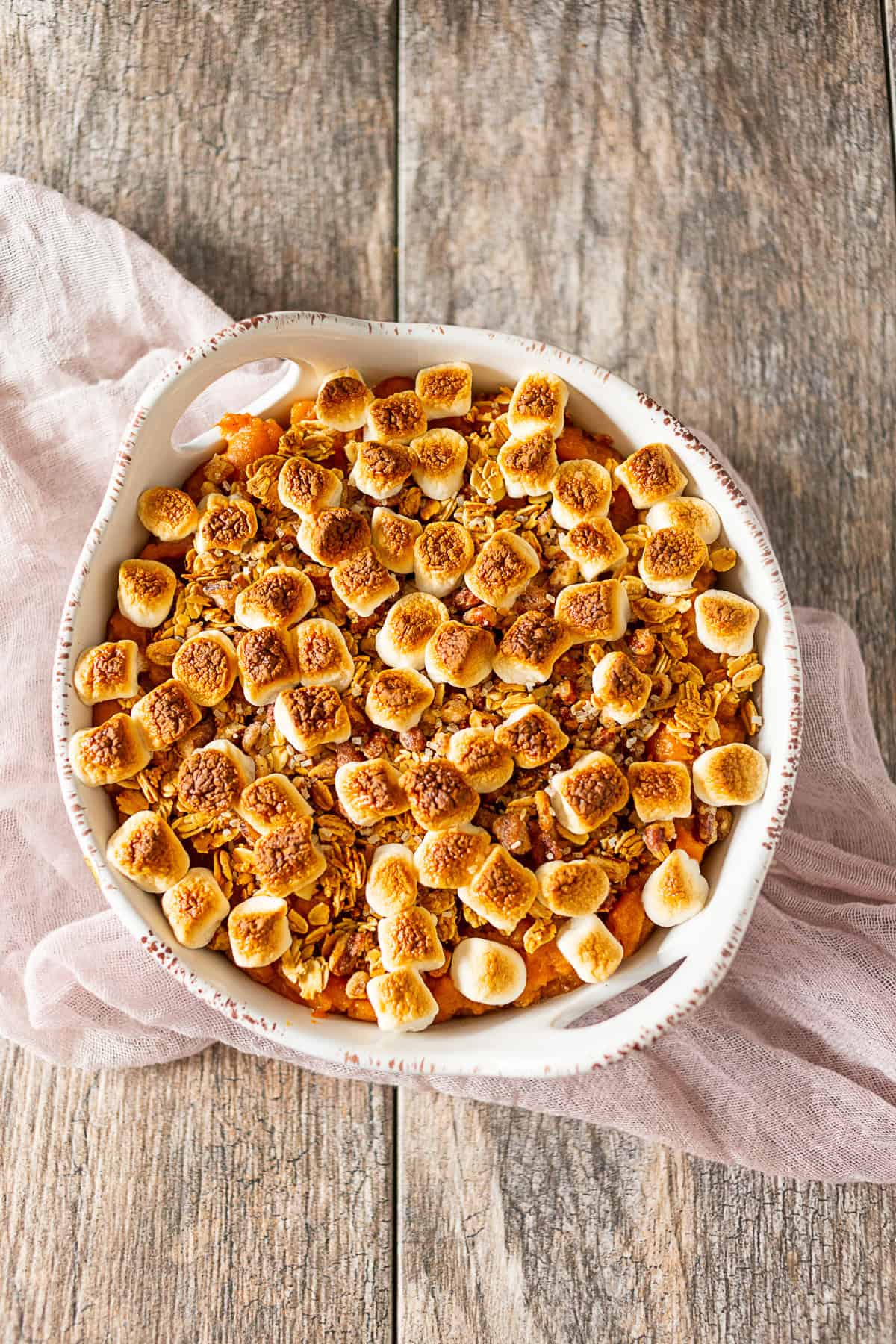 Vanilla Sweet Potato Casserole in a round white casserole dish. 