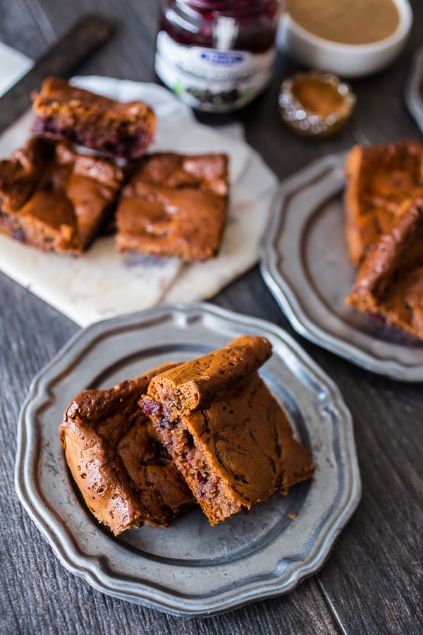 These paleo gingerbread blondies are packed full of holiday flavor. 100% Paleo made with almond butter, honey, warm spices and black currant jam.