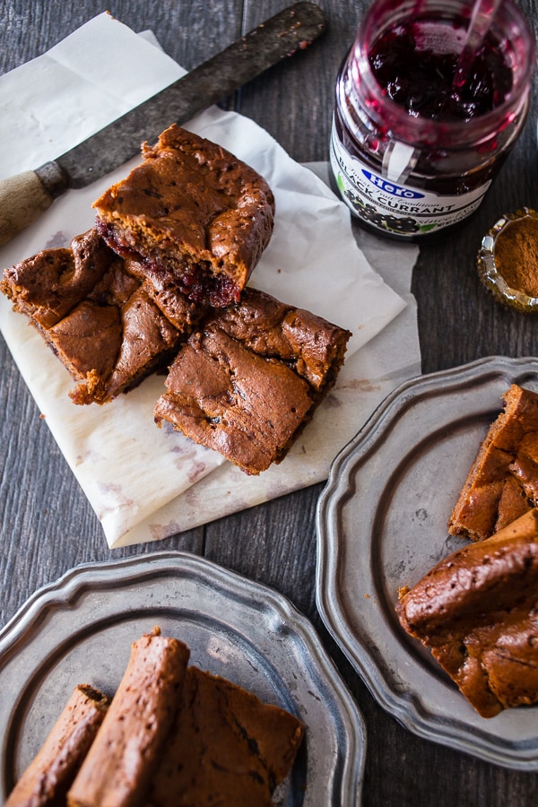 These paleo gingerbread blondies are packed full of holiday flavor. 100% Paleo made with almond butter, honey, warm spices and black currant jam.
