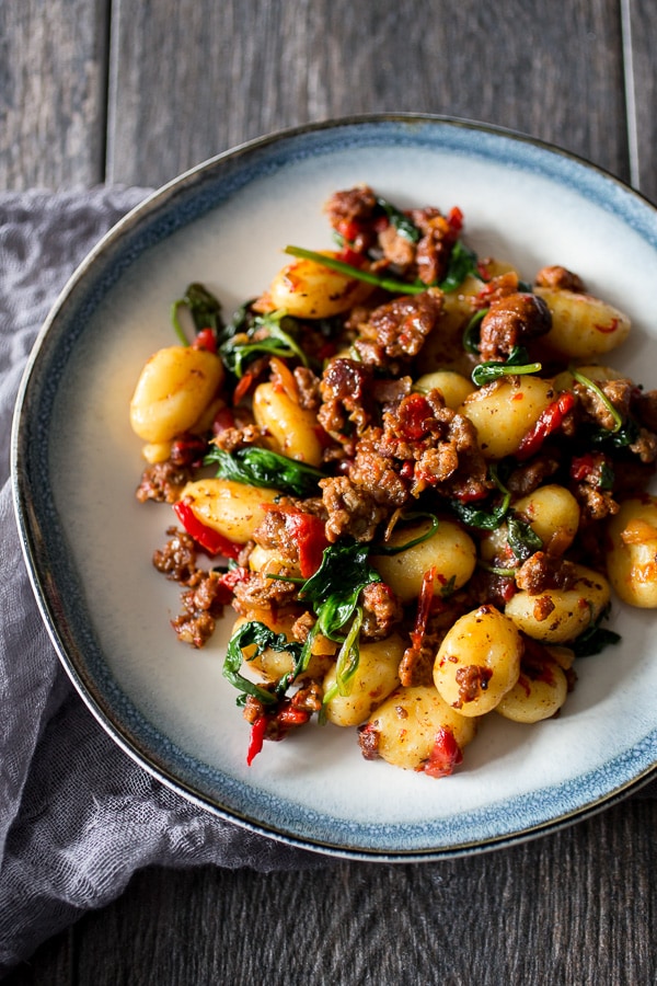 chorizo red pepper spinach gnocchi on a plate