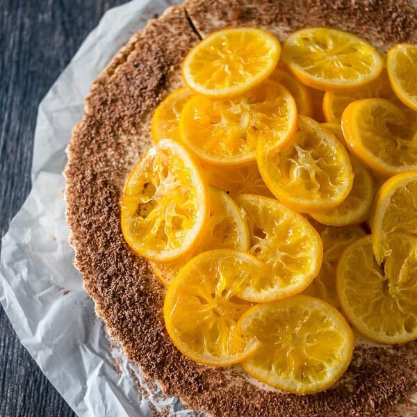 This no bake chocolate orange Greek yogurt cheesecake is just what your holiday needs. A rich chocolate crust filled with an orange filling and topped with candied orange slices.