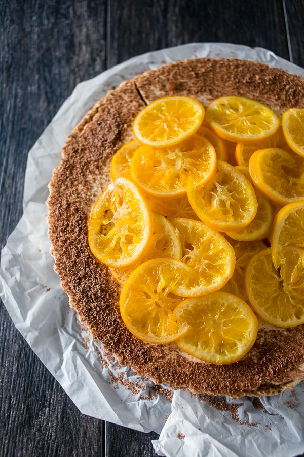 This no bake chocolate orange Greek yogurt cheesecake is just what your holiday needs. A rich chocolate crust filled with an orange filling and topped with candied orange slices. 
