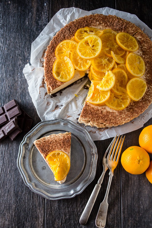 This no bake chocolate orange Greek yogurt cheesecake is just what your holiday needs. A rich chocolate crust filled with an orange filling and topped with candied orange slices.