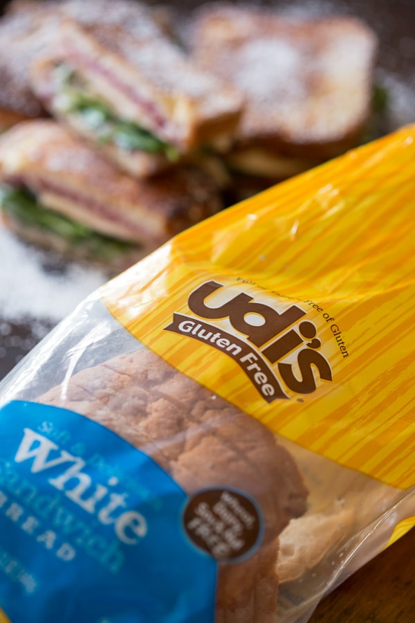 A bag of bread on a table. 