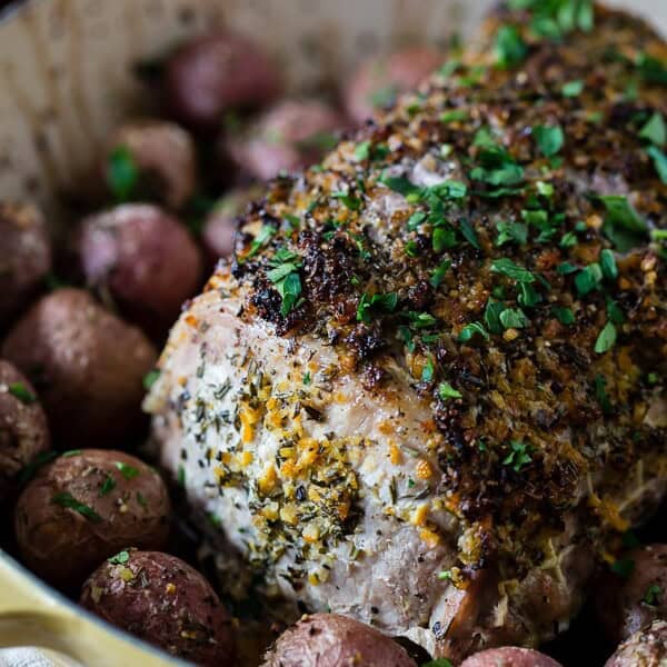 This citrus herb-crusted pork roast is perfect for the holidays. Rubbed down with flavor packed topping and roasted with small baby potatoes. Easy and delicious!