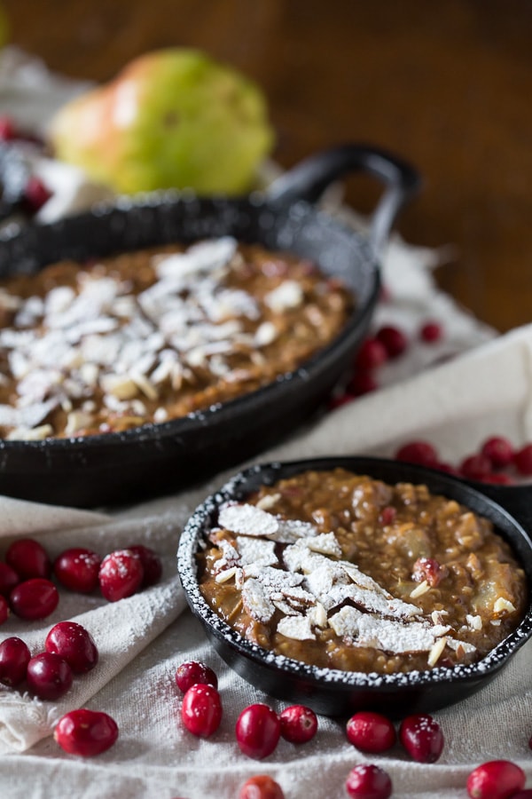 These cranberry pear baked steel cut oats are the perfect way to welcome the day. Full of delicious winter fruit flavor and hearty enough to keep you full for hours. Top with toasted nuts and a sprinkling of powdered sugar to jazz it up.