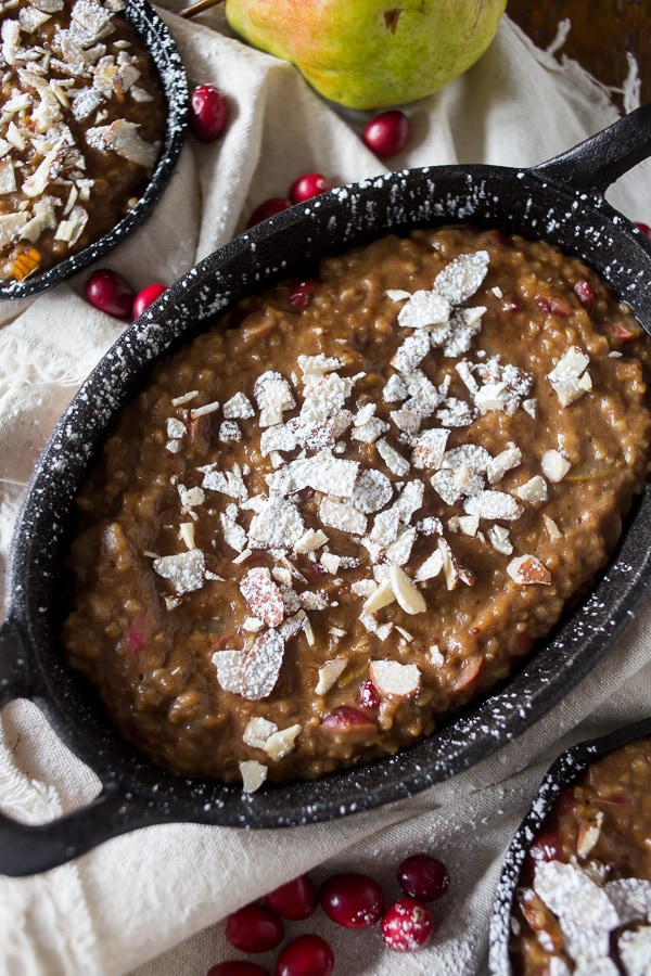 These cranberry pear baked steel cut oats are the perfect way to welcome the day. Full of delicious winter fruit flavor and hearty enough to keep you full for hours. Top with toasted nuts and a sprinkling of powdered sugar to jazz it up.