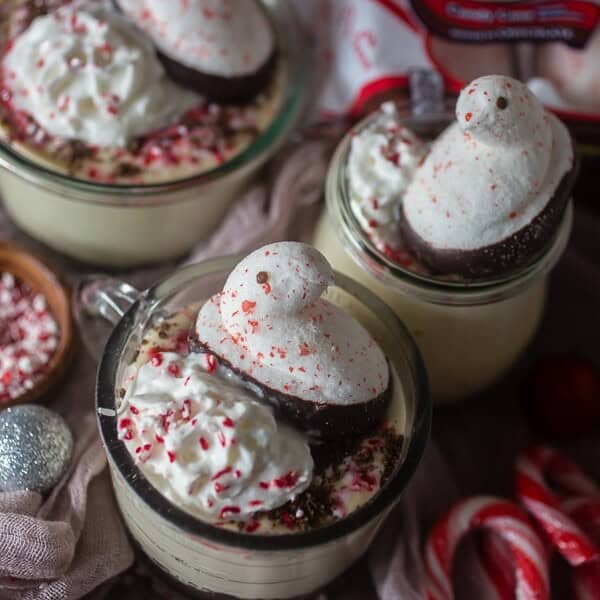 This no bake peppermint cheesecake is perfect for the holidays. Light and fully and topped with whipped cream, crushed peppermint candies and PEEPS.