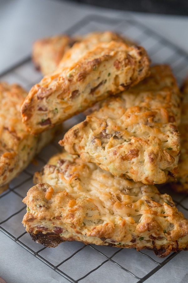 These parmesan prosciutto scones are packed full shredded parmesan, prosciutto, chives and lots of delicious butter. They are perfect for Christmas morning!