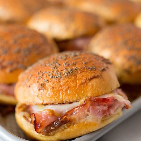 baked apple butter ham and cheese sliders in the baking tray