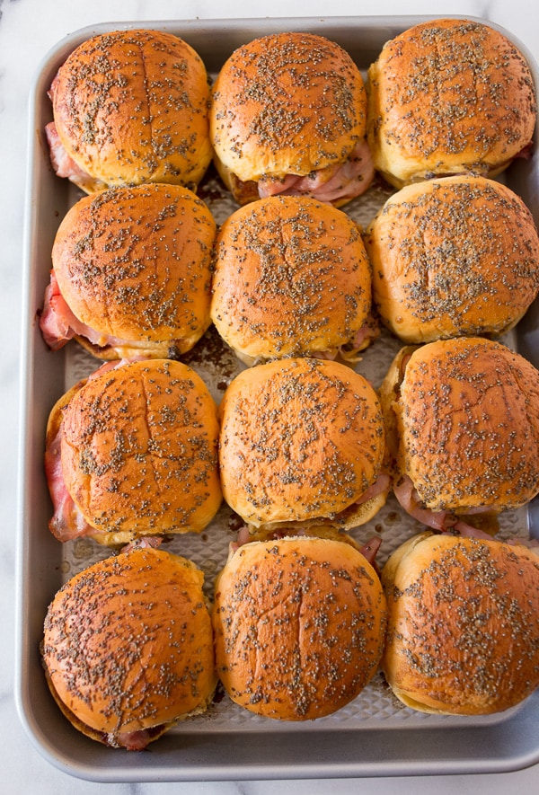 These baked apple butter ham and cheese sandwiches are the perfect party food. These baked apple butter ham and cheese sandwiches are the perfect party food.