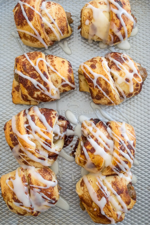 These totally simple 2 ingredient cinnamon roll wrapped sausages are just what your morning needs. Easy to make and the perfect sweet and savory bite.