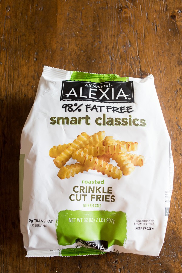 a bag of crinkle cut fries used for dipping in the warm loaded baked potato dip. 