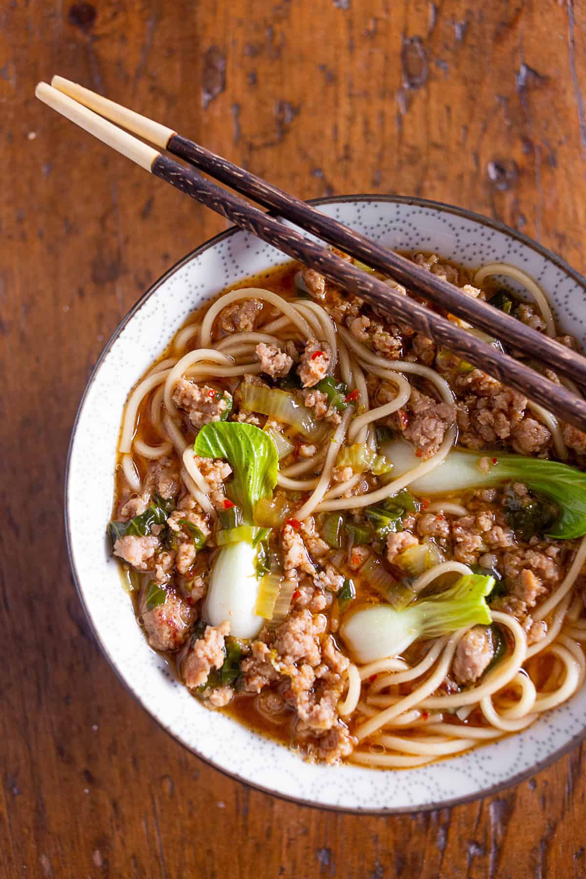 Spicy Pork Noodle Bowl in a ceramic bowl.