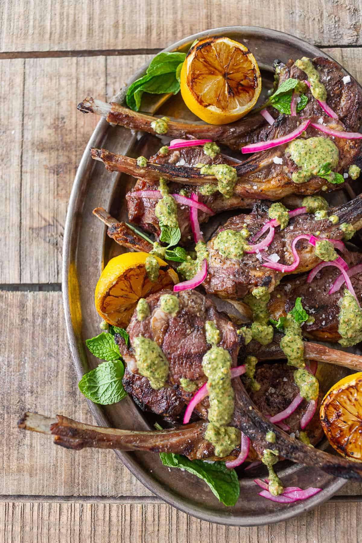 Grilled Lamb Chops with Pistachio Mint Pesto on a serving platter.