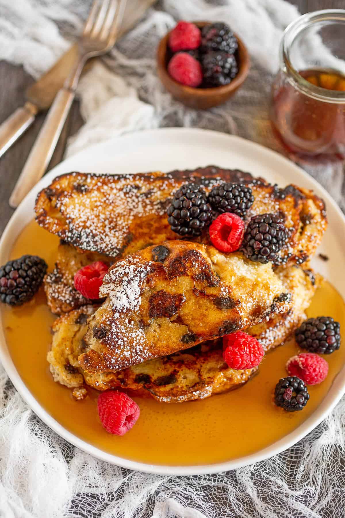 Irish Soda Bread French Toast on a plate with berries.