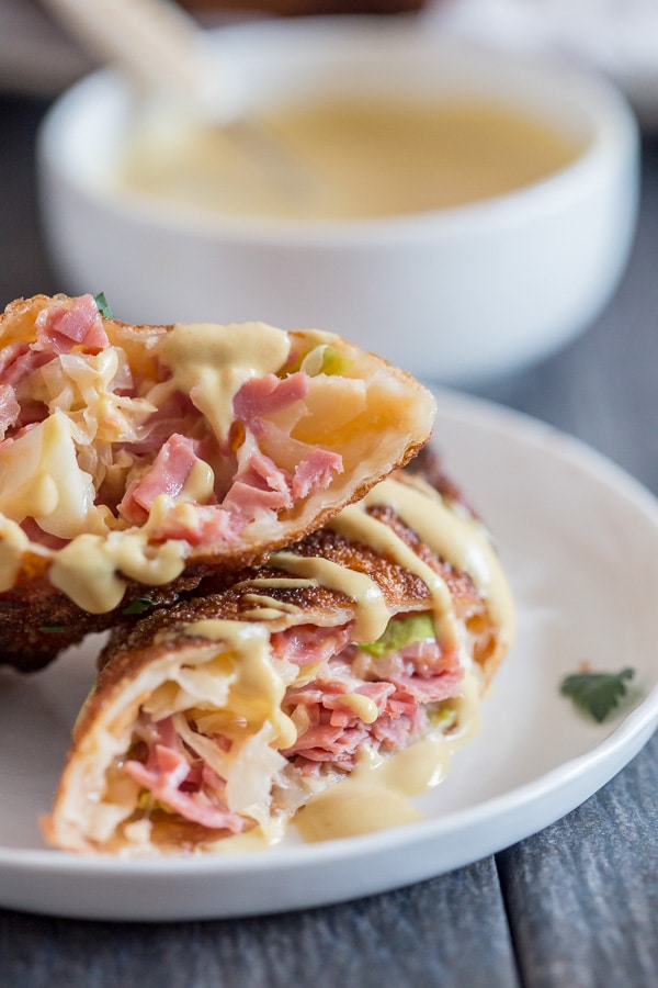 Reuben Egg Rolls cut in half. 