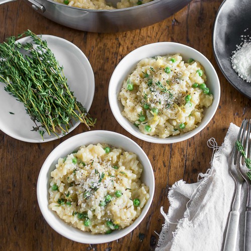 This pea Parmesan risotto is minimal stir and turns out perfectly creamy. It's packed full of fresh lemon zest, sweet spring peas and sharp Parmesan cheese.