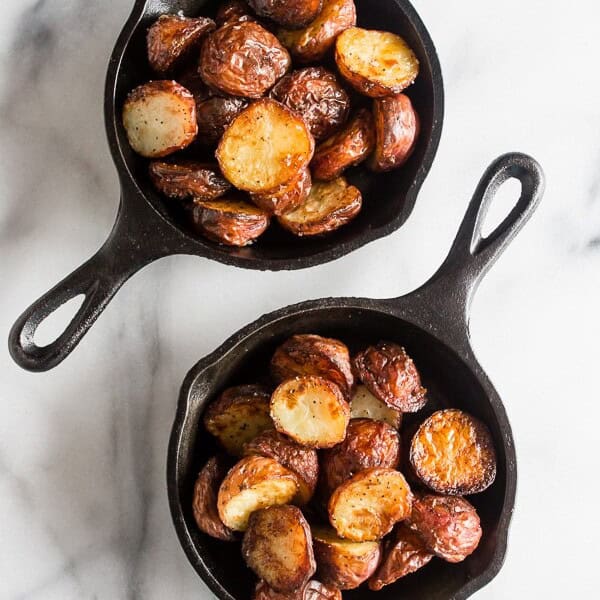 These perfect roast potatoes come out of the oven perfectly seasoned and perfectly crispy. I know that's a lot of perfect for one sentence but these potatoes live up to their name!