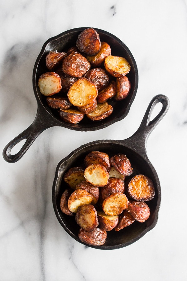 These perfect roast potatoes come out of the oven perfectly seasoned and perfectly crispy. I know that's a lot of perfect for one sentence but these potatoes live up to their name!