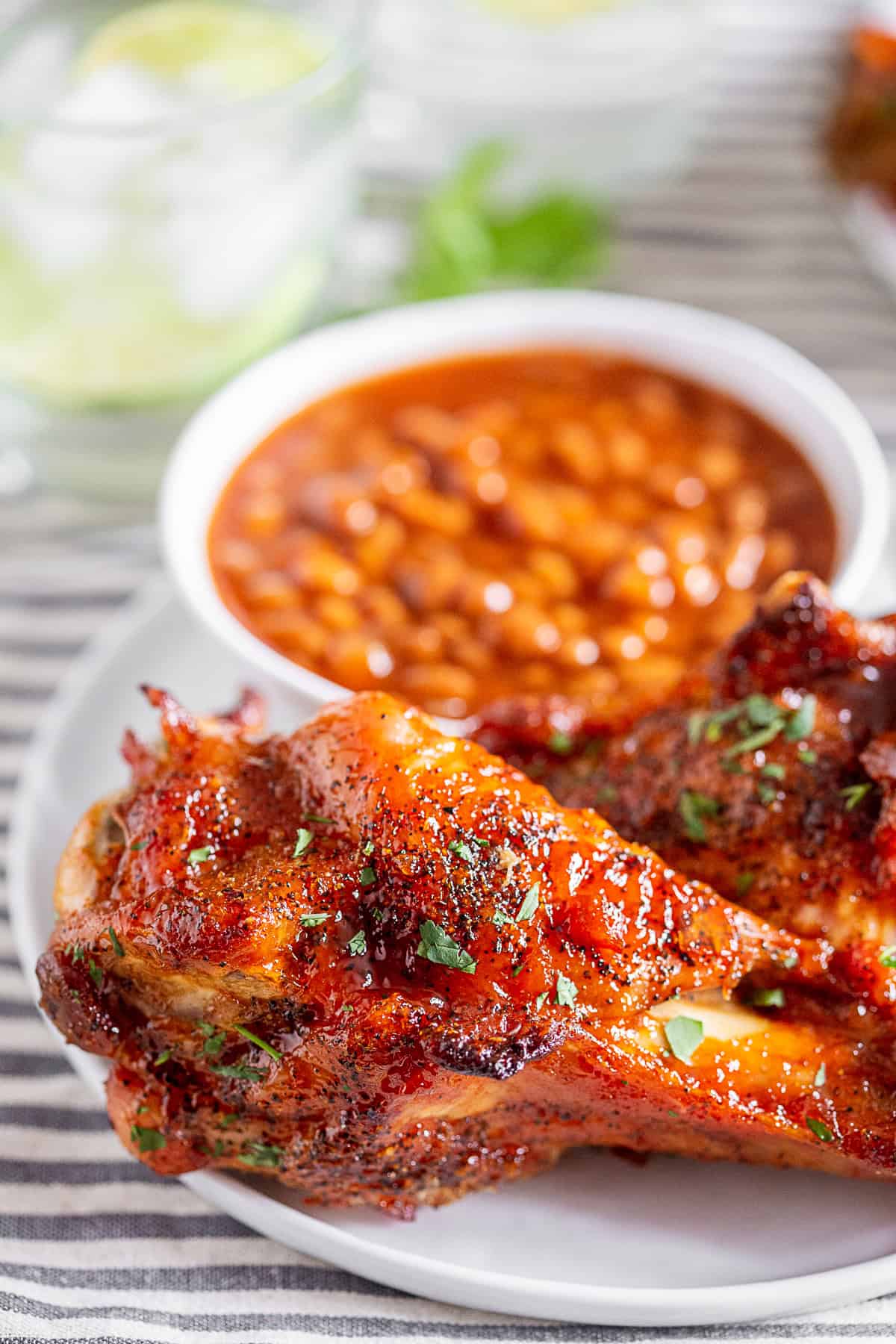 Peach BBQ Grilled Turkey Legs on a large serving platter.