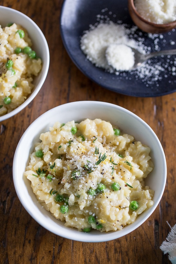This pea Parmesan risotto is minimal stir and turns out perfectly creamy. It's packed full of fresh lemon zest, sweet spring peas and sharp Parmesan cheese.