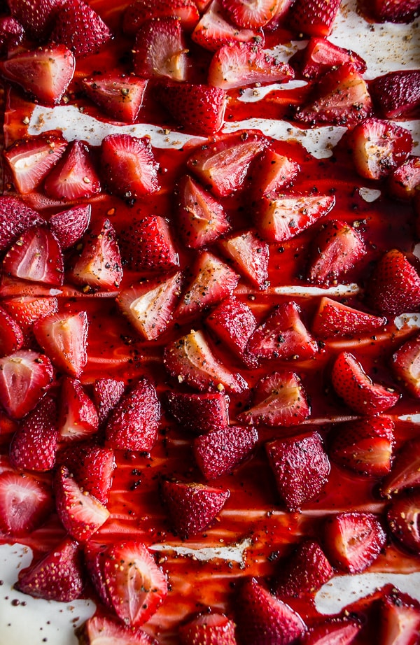 These roasted strawberry Greek yogurt scones are packed full of fresh roasted berries, vanilla Greek yogurt and made with white whole wheat flour! So easy to make and perfect for a lazy Sunday breakfast treat.