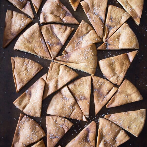 These cumin spiced pita chips are perfectly spiced and great for dipping into hearty vegetable dips or creamy hummus. Ready in under 30 minutes and super simple!