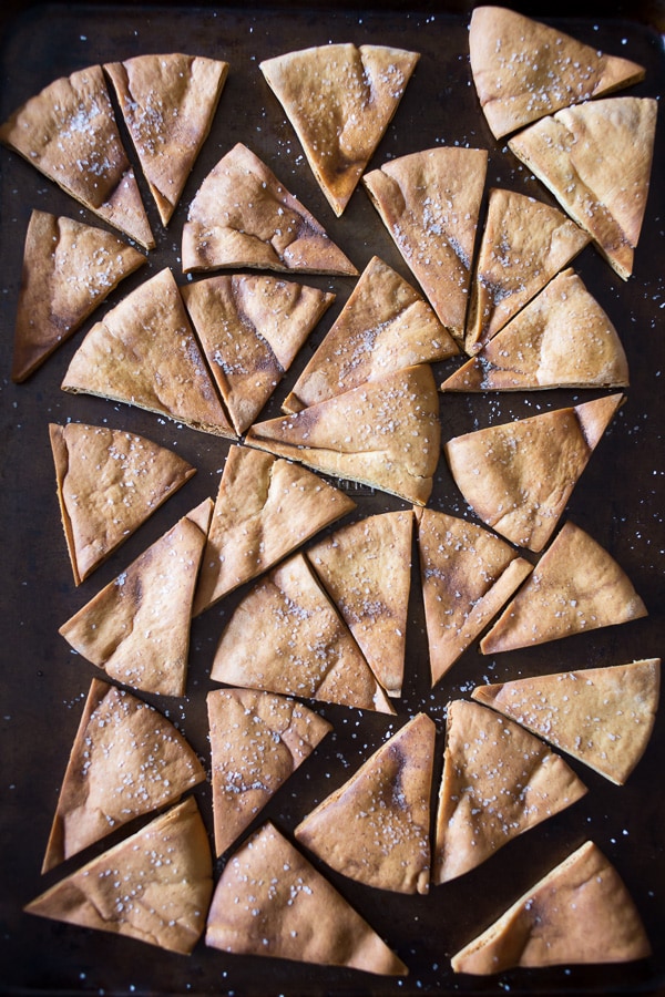 These cumin spiced pita chips are perfectly spiced and great for dipping into hearty vegetable dips or creamy hummus. Ready in under 30 minutes and super simple!