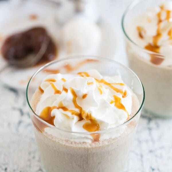 This boozy caramel apple butter milkshake is the perfect adult dessert to enjoy all year round. Full of vanilla bean ice cream, apple butter, spiced rum and just a touch of delicious caramel. You'll love this sweet treat!