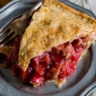 This homemade strawberry rhubarb pie is the quintessential summer pie. Filled with sun-ripened strawberries and tart rhubarb. Serve warm, room temperature or with a big giant scoop of ice cream.