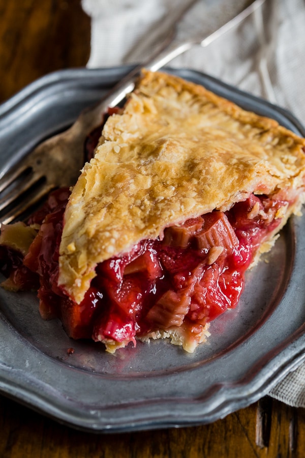 A slice of pie on a small plate.