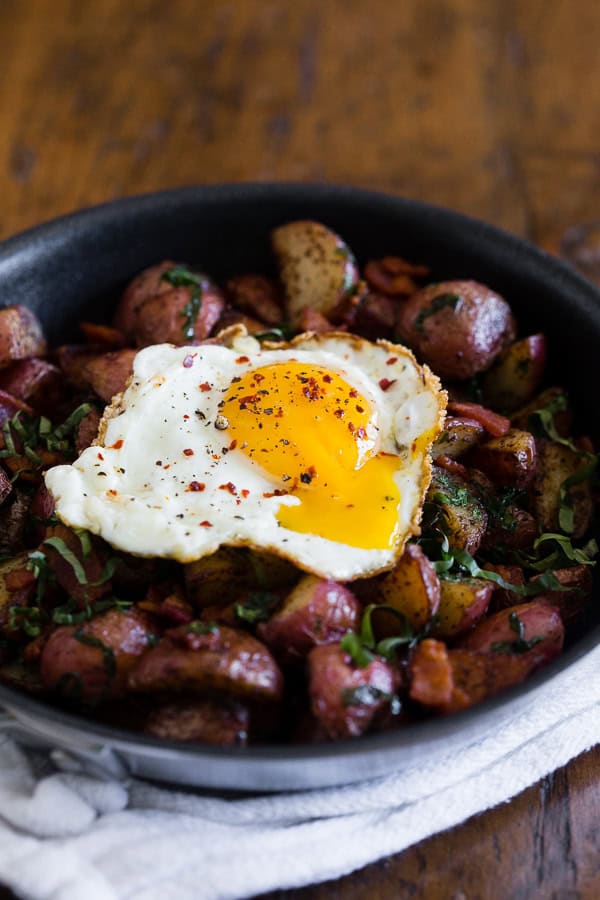 Basil Bacon Hash topped with a runny egg. 