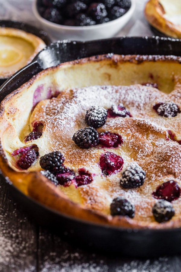Blackberry Lemon Dutch Baby topped with fresh berries.