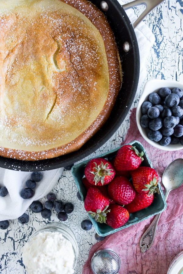Vanilla Bean Dutch Baby in a skillet.