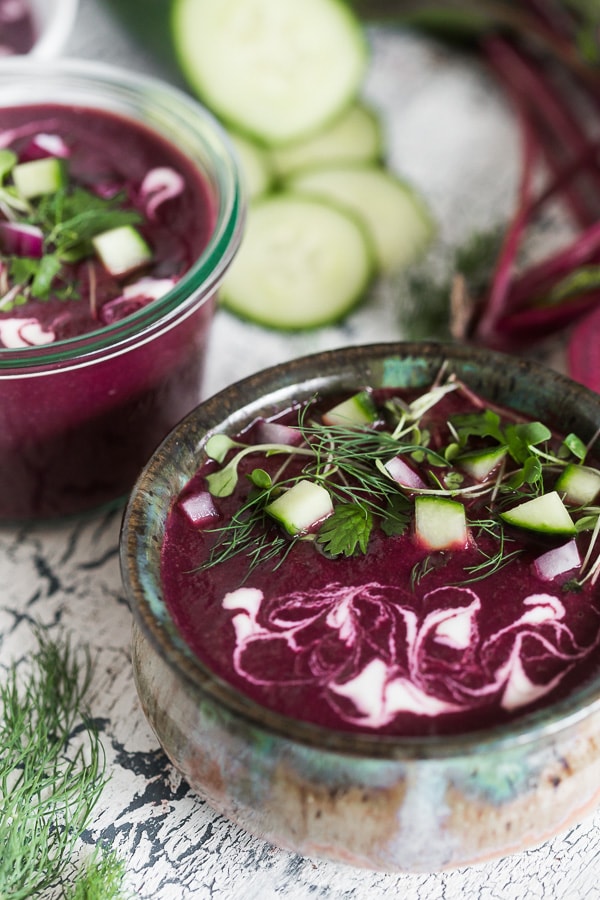 This summery beet gazpacho is packed full of vegetables and topped with fresh herbs, fresh chopped vegetables and a drizzle of Greek yogurt. You'll love how simple this soup is to throw together and it's perfect for hot summer nights.