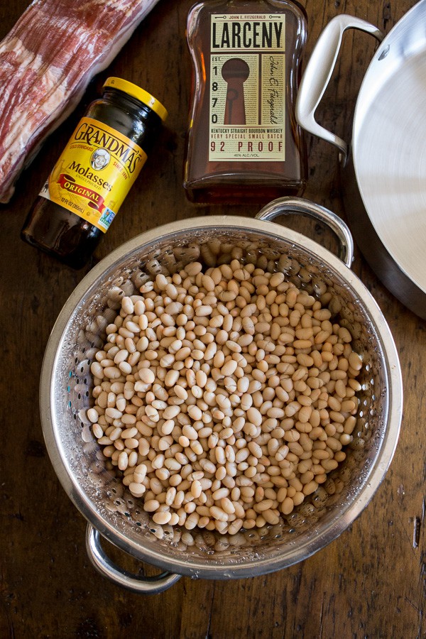 Molasses Bacon Baked Beans ingredients on a table. 